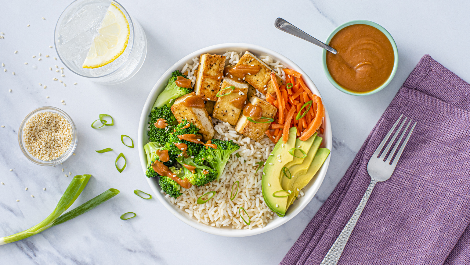 buddha bowl with spicy peanut sauce