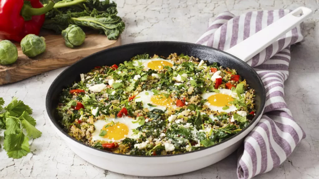 green shakshuka with quinoa